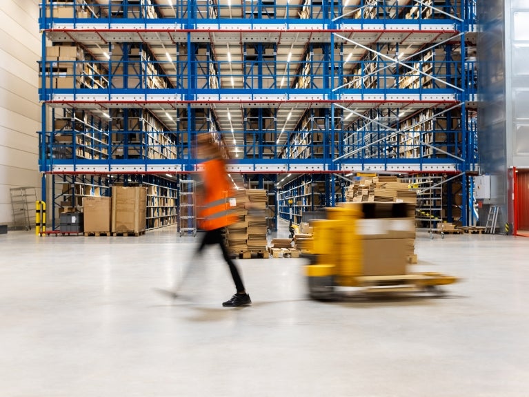 girl in warehouse walking