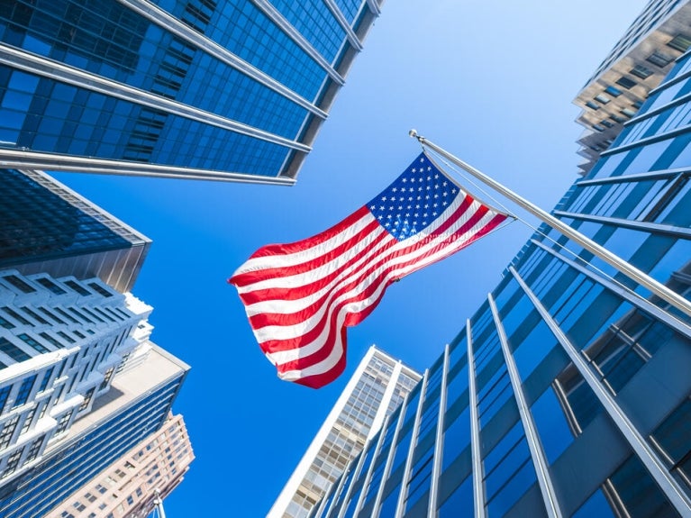 Flag hanging from corporate building