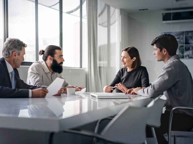 Trust & Estates Planning, people around a table in an office 