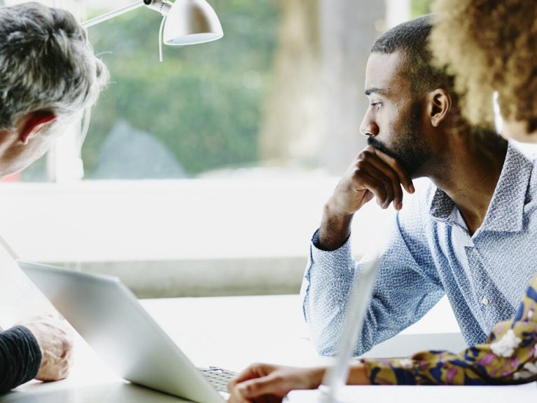 diverse professionals in meeting