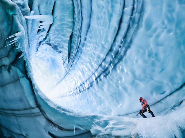 Man in an ice tunnel