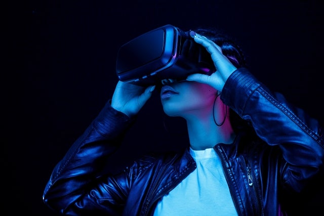 Woman wearing virtual reality headset