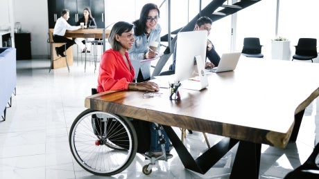 Disabled worker in office setting