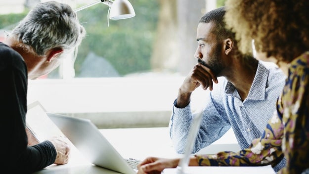 diverse professionals in meeting