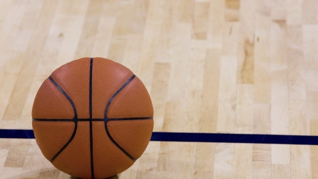 Basketball sitting on the court